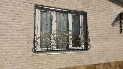 Кованые решетки на окна и двери | Художественная ковка решеток на заказ
